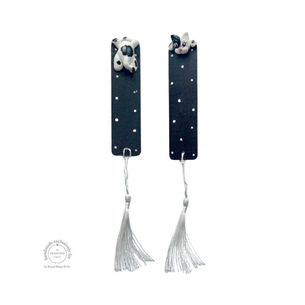a black and white polka playful cat bookmark with white hanging tassel