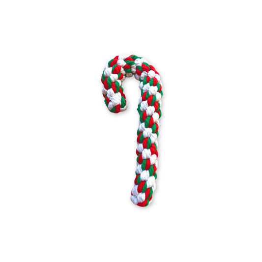 A red green and white rope toy shaped like a candy cane
