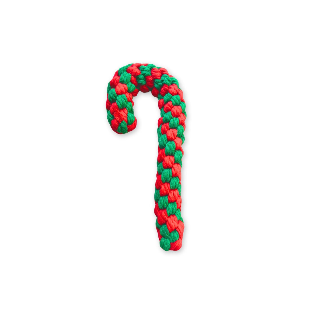 A red and green weaved rope toy for dogs, shaped like a candy cane