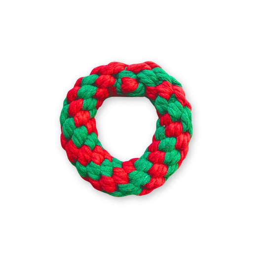 A red and green ring rope toy for dogs