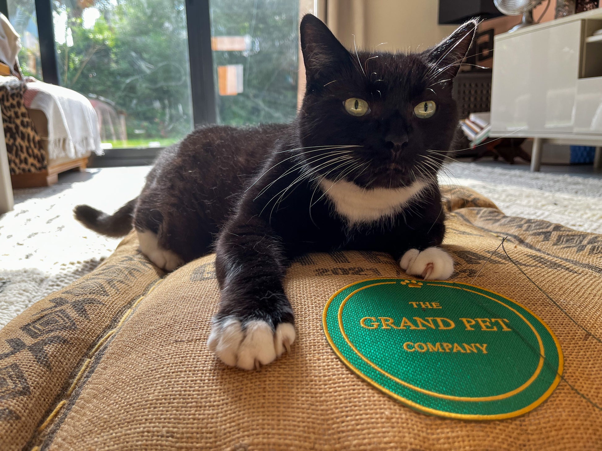Embroidered handmade pet bed made from natural coffee sack