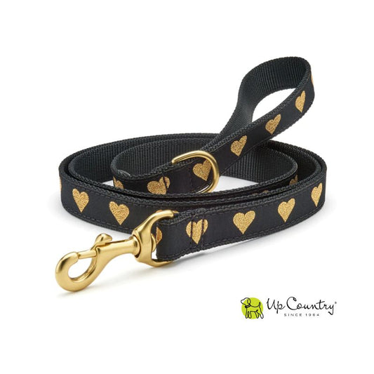 Black dog leash with gold hearts and gold clasp on black webbing, featuring the 'Up Country' brand.