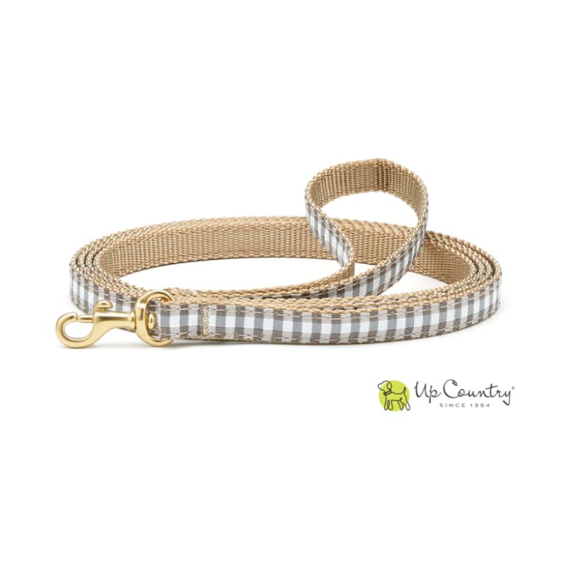 Dog leash with grey and white gingham pattern and gold clasp on tan webbing on a white background, featuring the 'Up Country' brand.