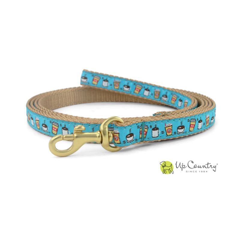 Dog leash with blue coffee cup and coffee bean pattern and gold clasp on a white background