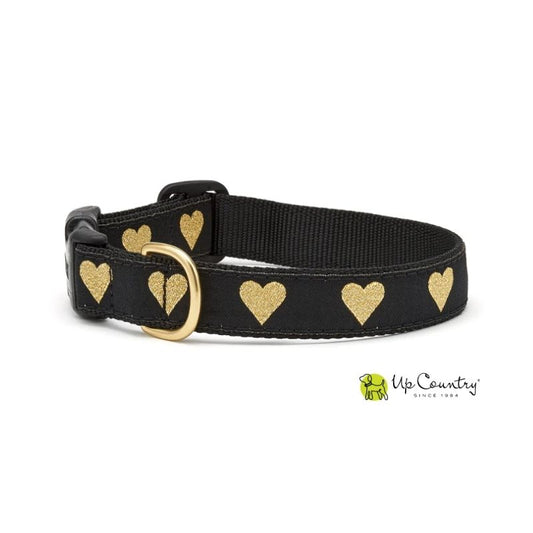 Black dog collar with gold hearts and a gold buckle on a white background, featuring the 'Up Country' brand.