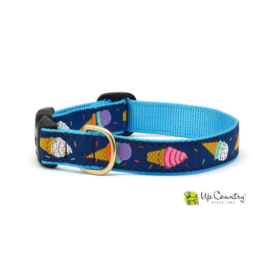 Dog collar with colourful ice cream cone pattern on a blue background, brand 'Up Country' visible.