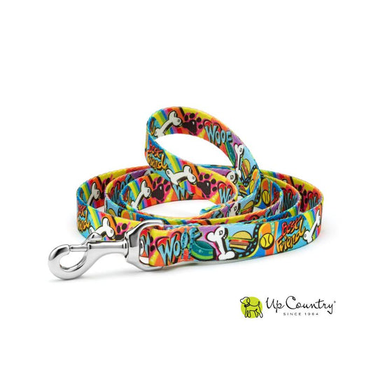 Colorful dog leash with 'Woof' 'best Friend' and bone designs on a white background, featuring the 'Up Country' brand.